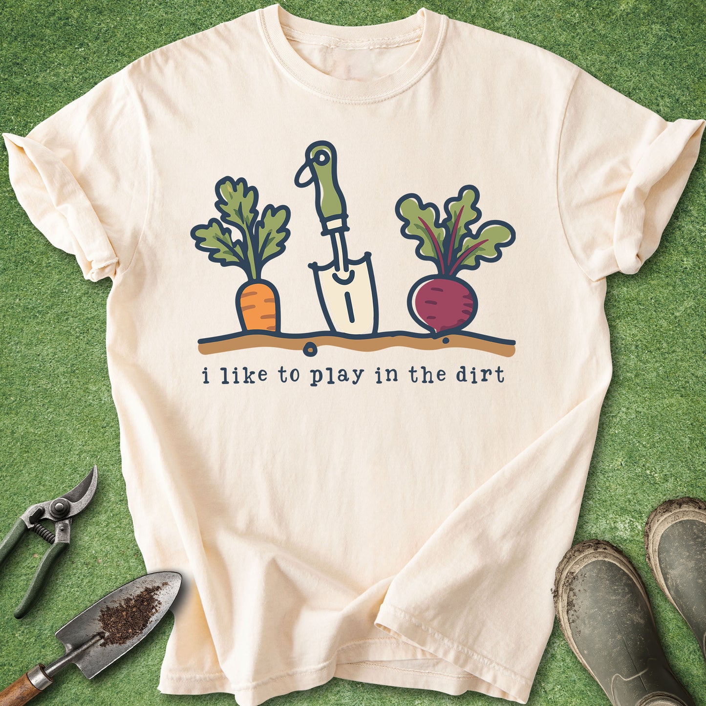 Ivory t-shirt with “I like to play in the dirt” text and vegetable garden illustration
