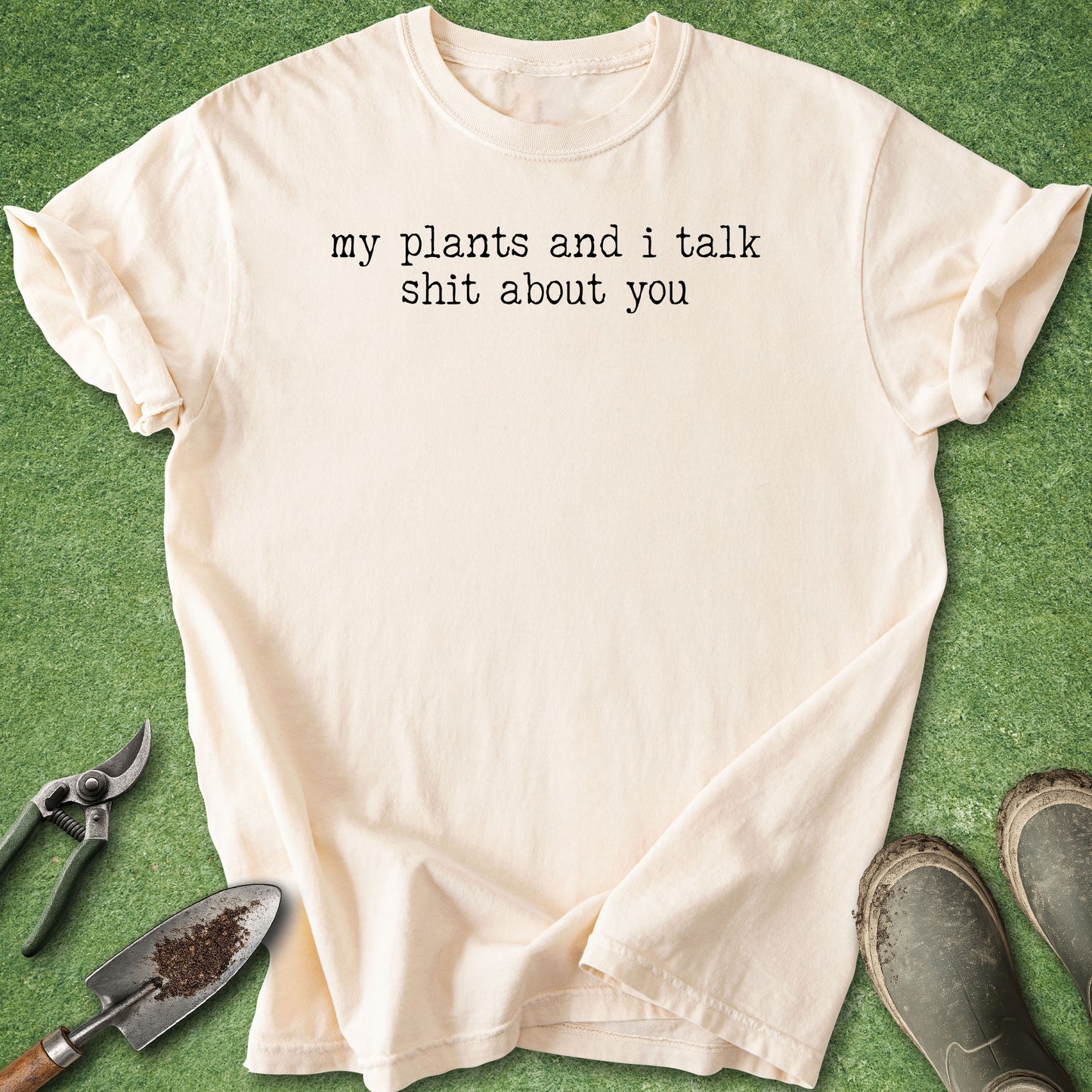 Comfort Colors blossom t-shirt featuring the funny quote "My Plants and I Talk Shit About You" in white vintage-style typewriter lettering.
