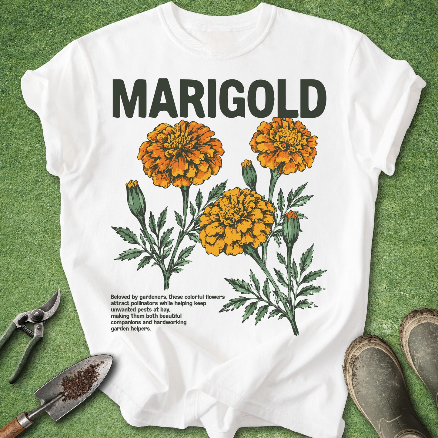 White t-shirt with marigold flower design and text on a green background