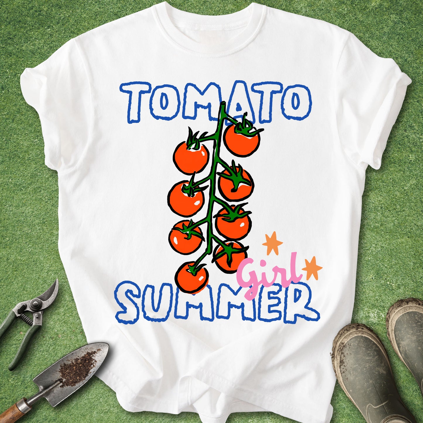 White t-shirt with 'Tomato Girl Summer' design on a green background
