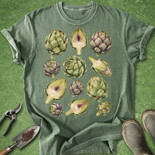 Green t-shirt featuring a vintage botanical collection of whole, halved and cut artichokes in natural green and purple tones.