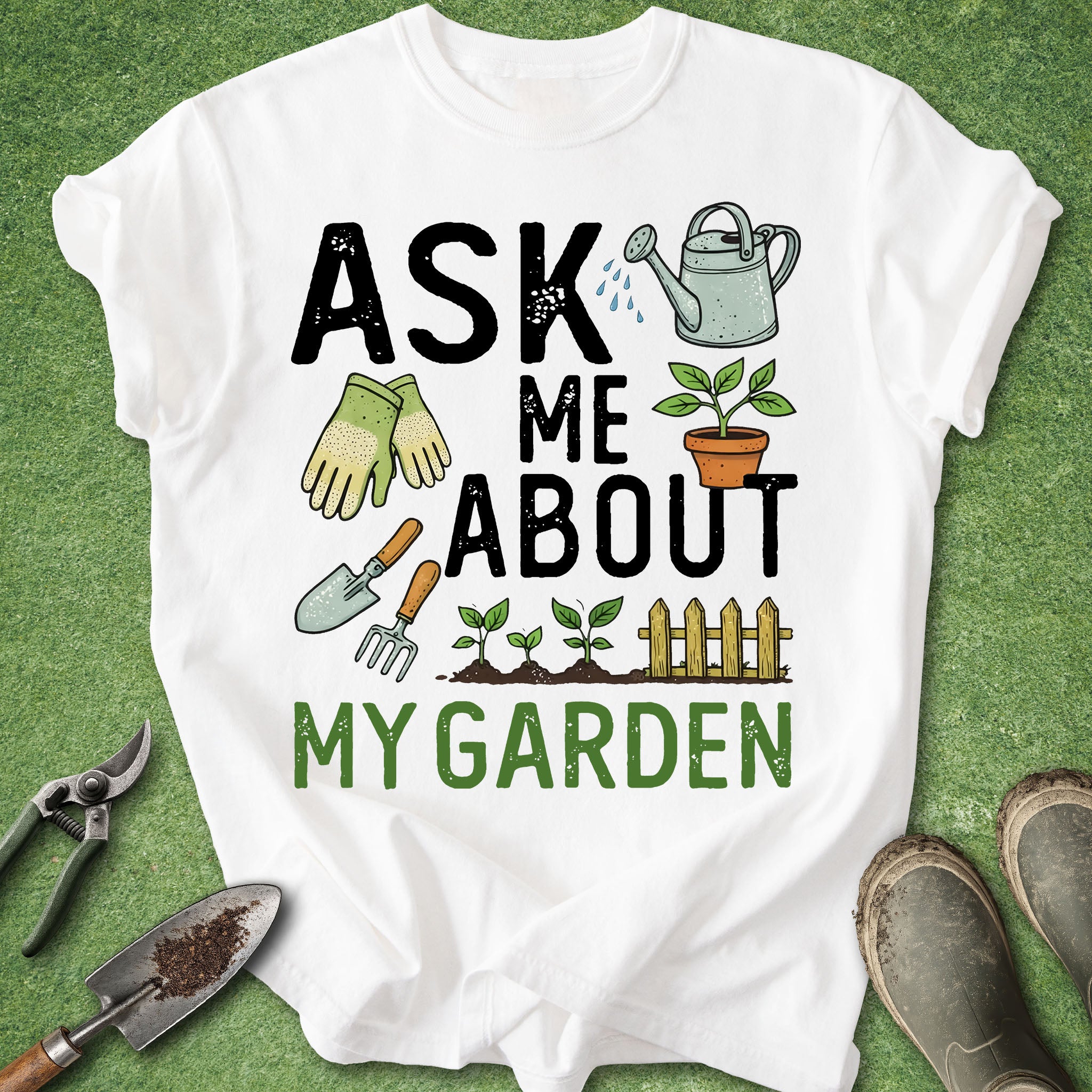 White t-shirt with gardening-themed text and graphics on a green background