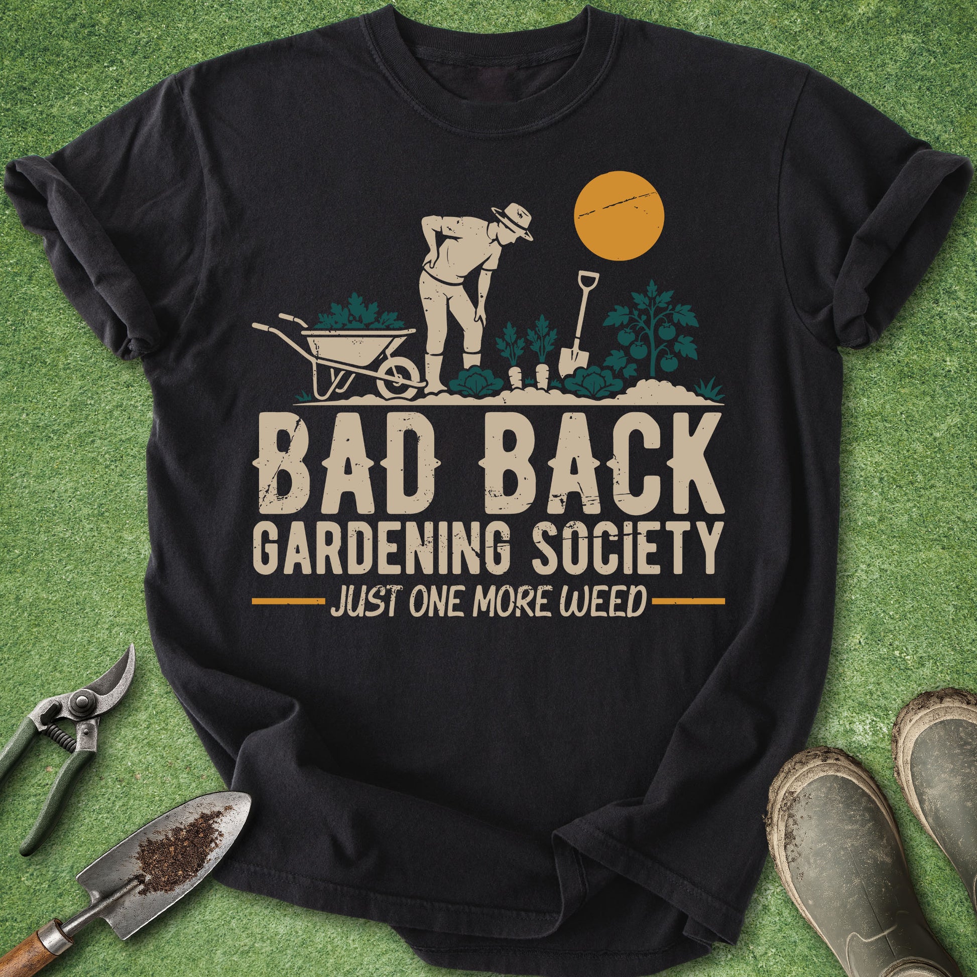 Funny gardening t-shirt with gardener illustration and “Bad Back Gardening Society Just One More Weed” quote on black shirt