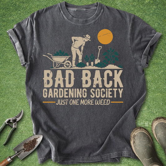 Gray t-shirt with gardening graphic and text on a green grass background