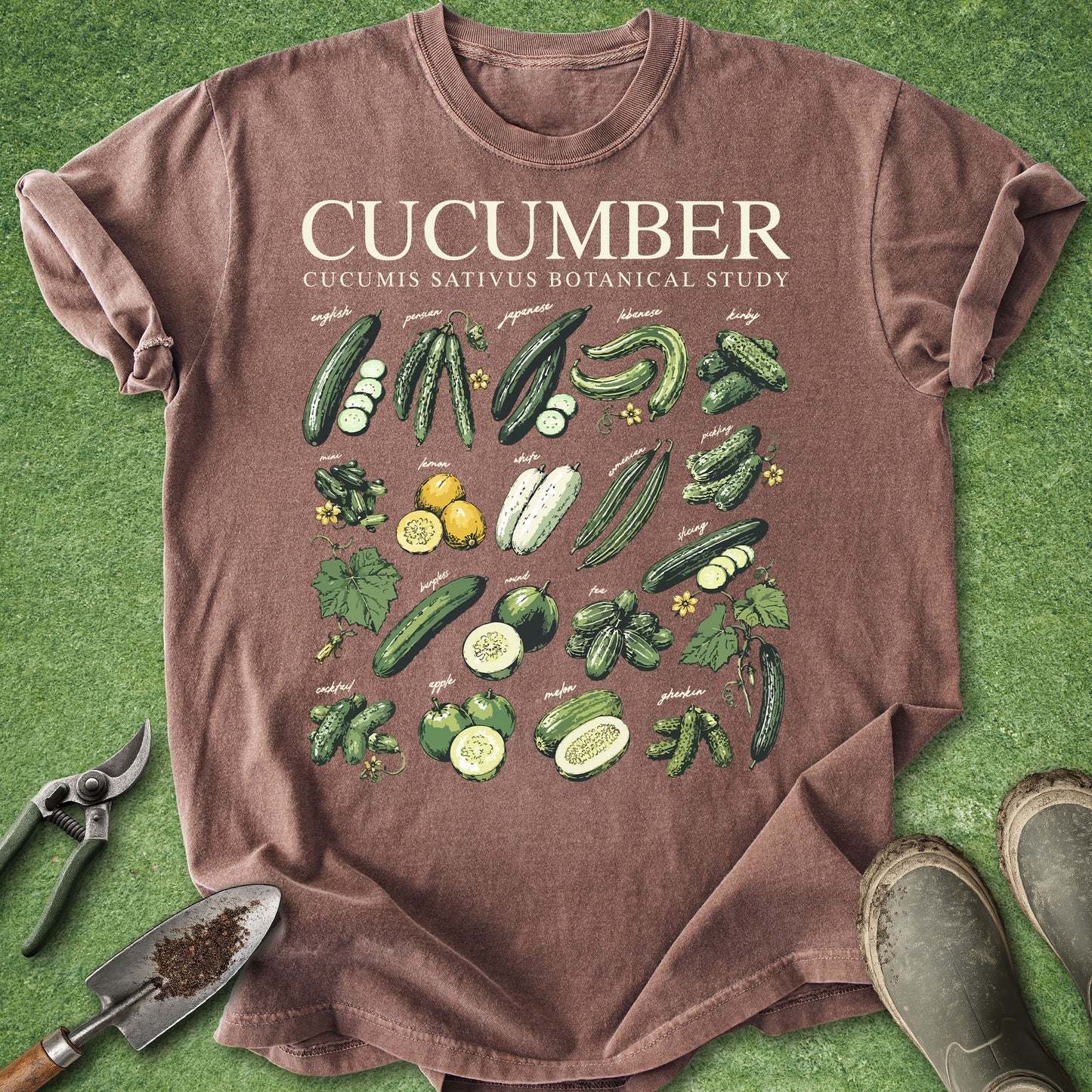Brown t-shirt with cucumber illustrations on a green background