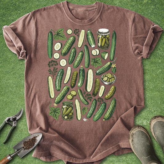Brown t-shirt with cucumber graphic on a green background