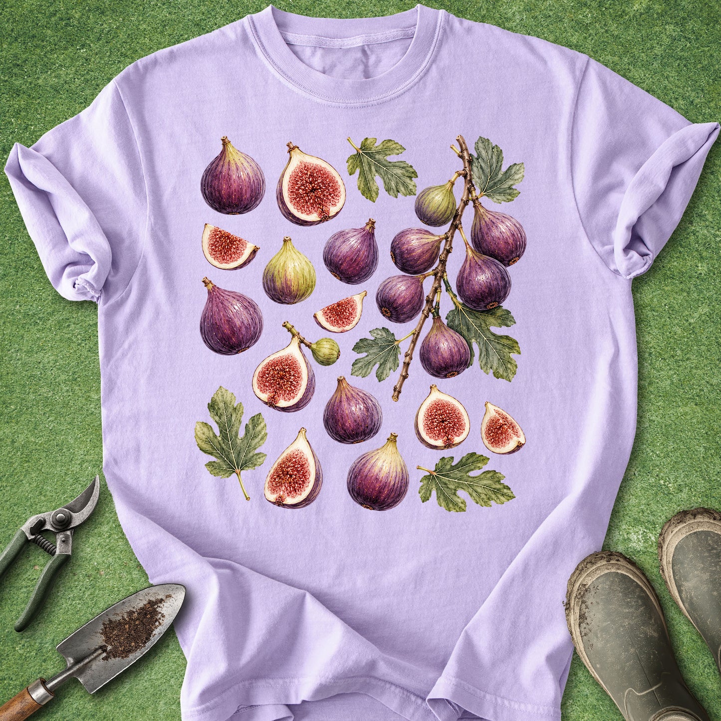 Purple t-shirt featuring a vintage botanical illustration of ripe purple figs, sliced figs, fig branches and green leaves.