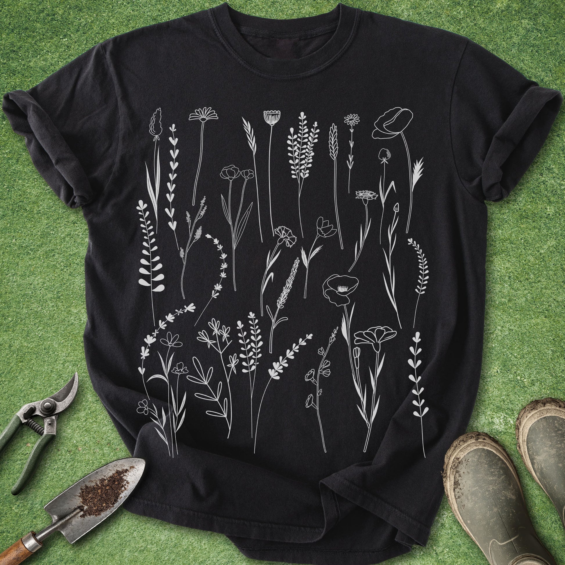 Minimal botanical wildflower line art t-shirt with delicate floral illustrations on black shirt