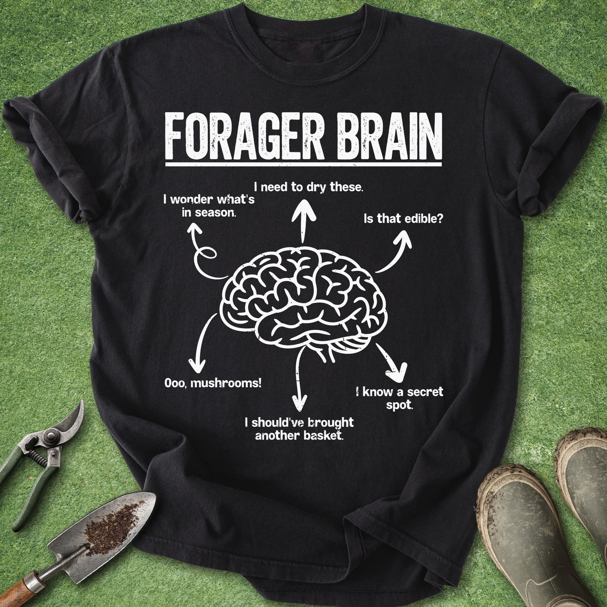 Black t-shirt with 'Forager Brain' graphic on a green background with gardening tools.