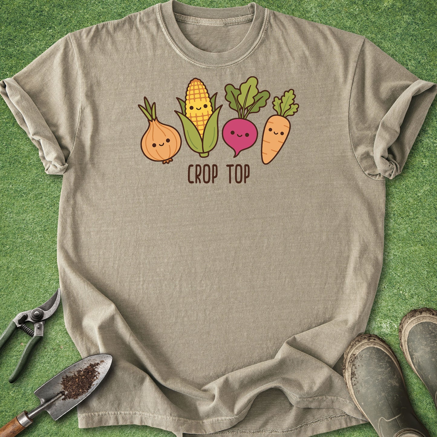 Beige t-shirt with cartoon vegetables and 'Crop Top' text on a green background