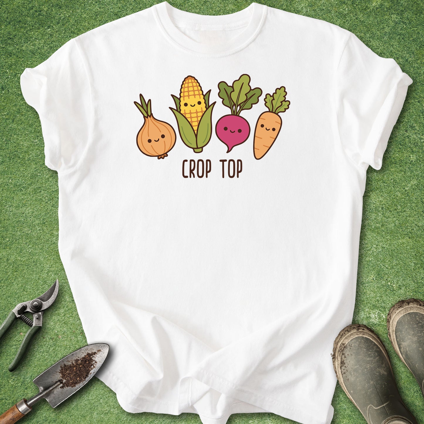 White t-shirt with cartoon vegetables and 'Crop Top' text on a green background