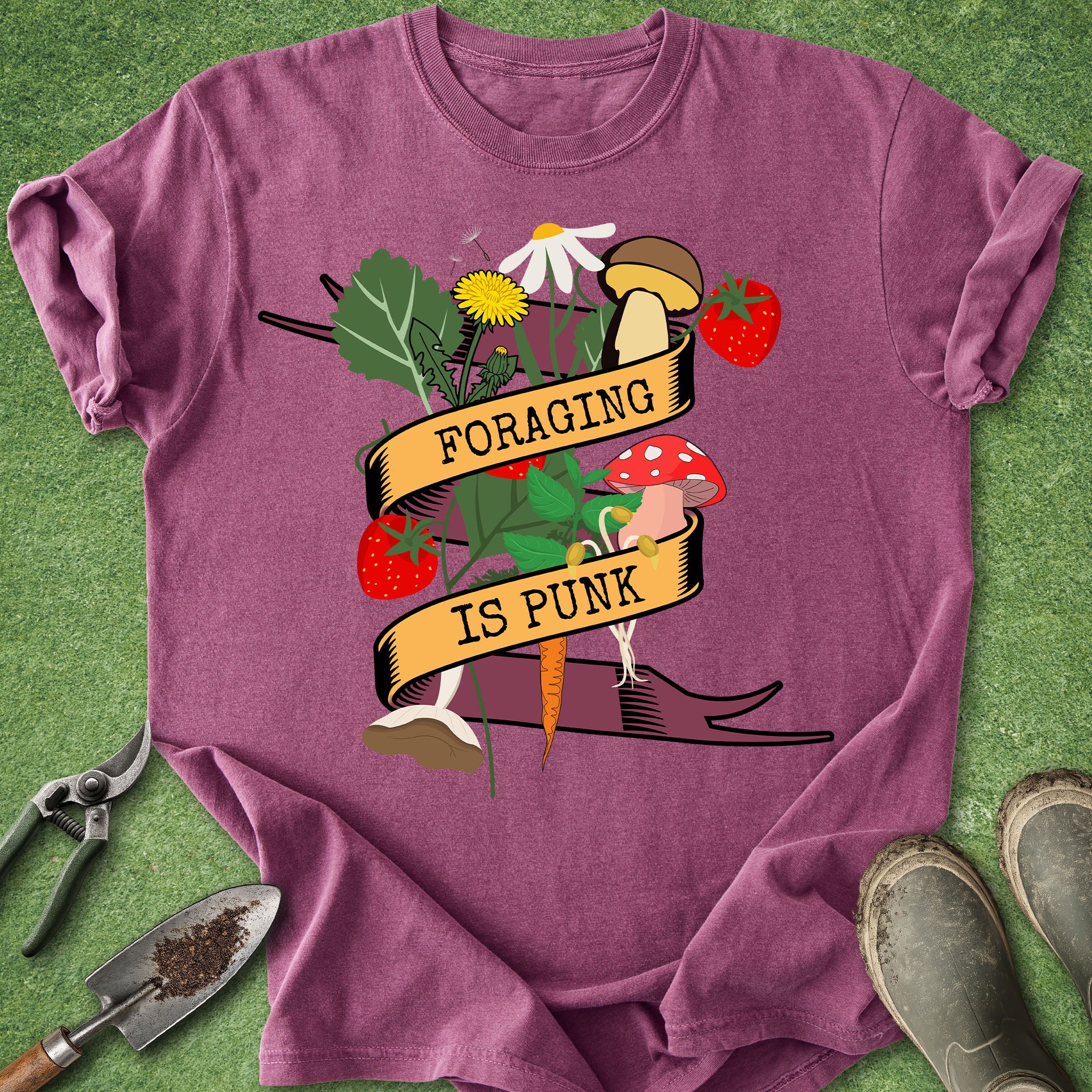 Purple t-shirt with 'Foraging is Punk' graphic on a green background