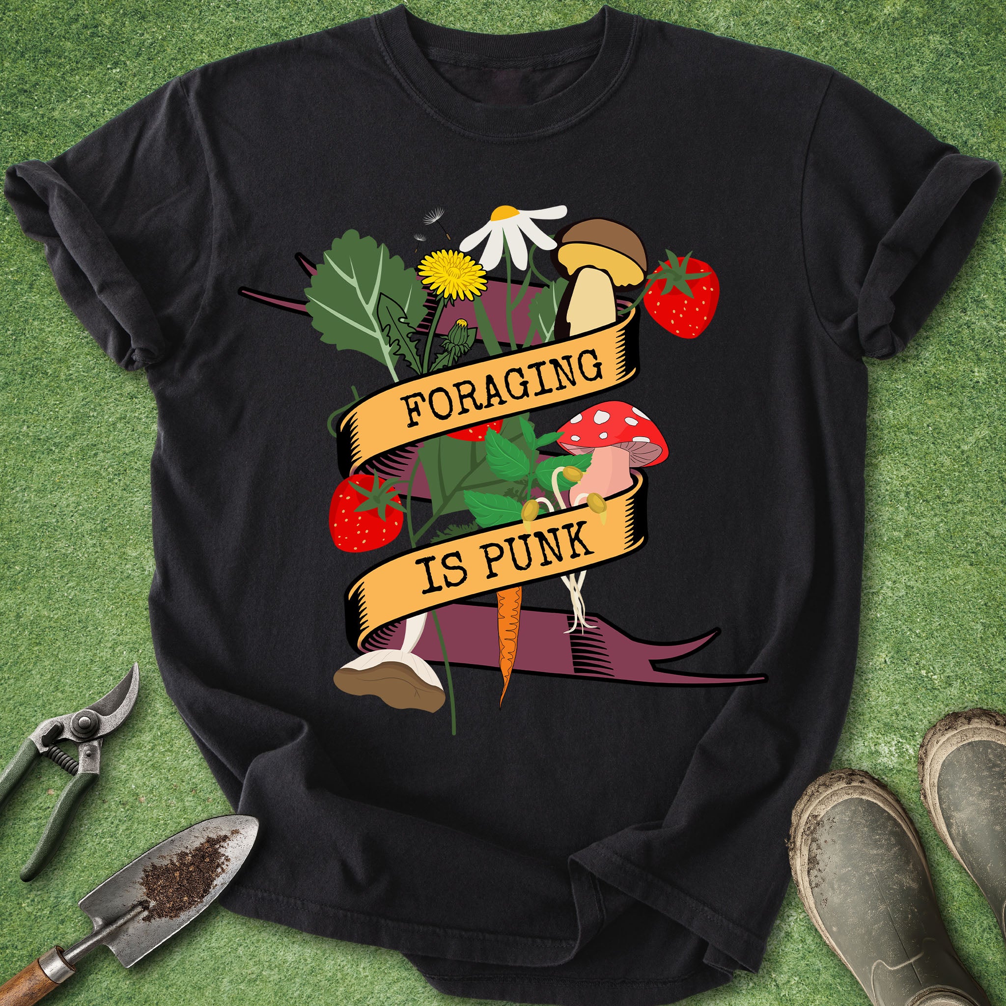 Black t-shirt with 'Foraging is Punk' graphic on a green background with gardening tools.