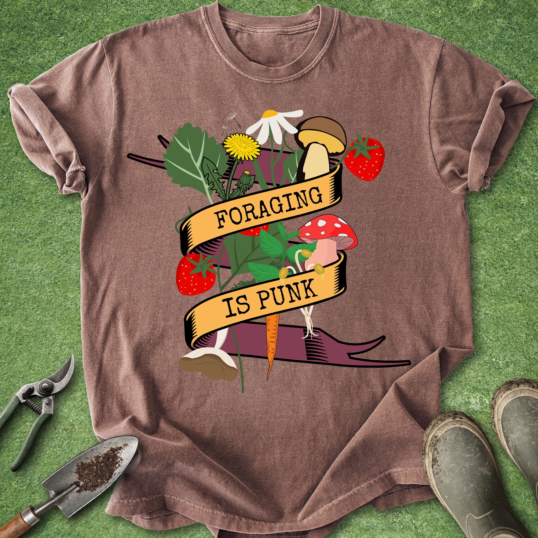 Brown t-shirt with 'Foraging is Punk' graphic on a green background