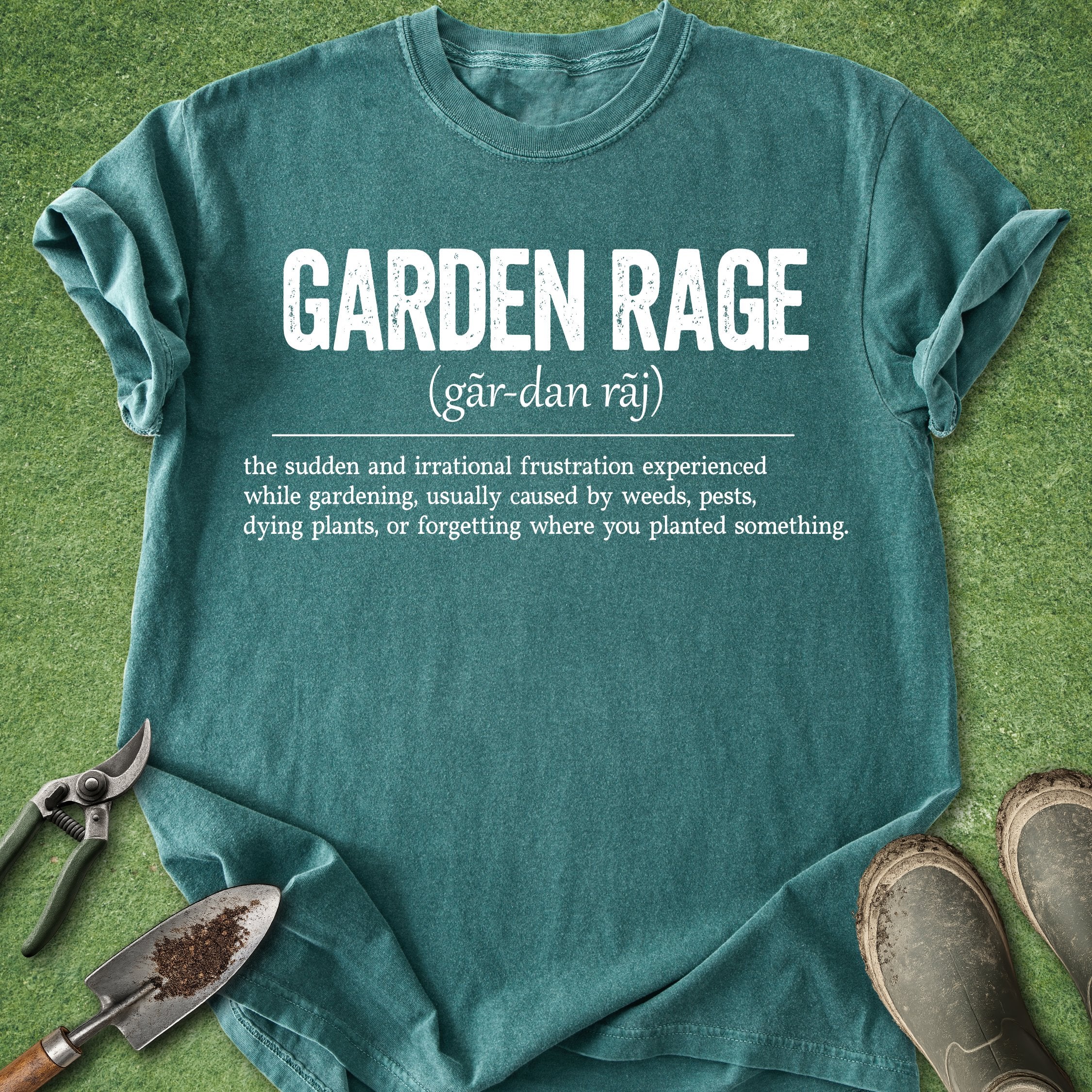 Teal t-shirt with 'Garden Rage' definition on a grass background