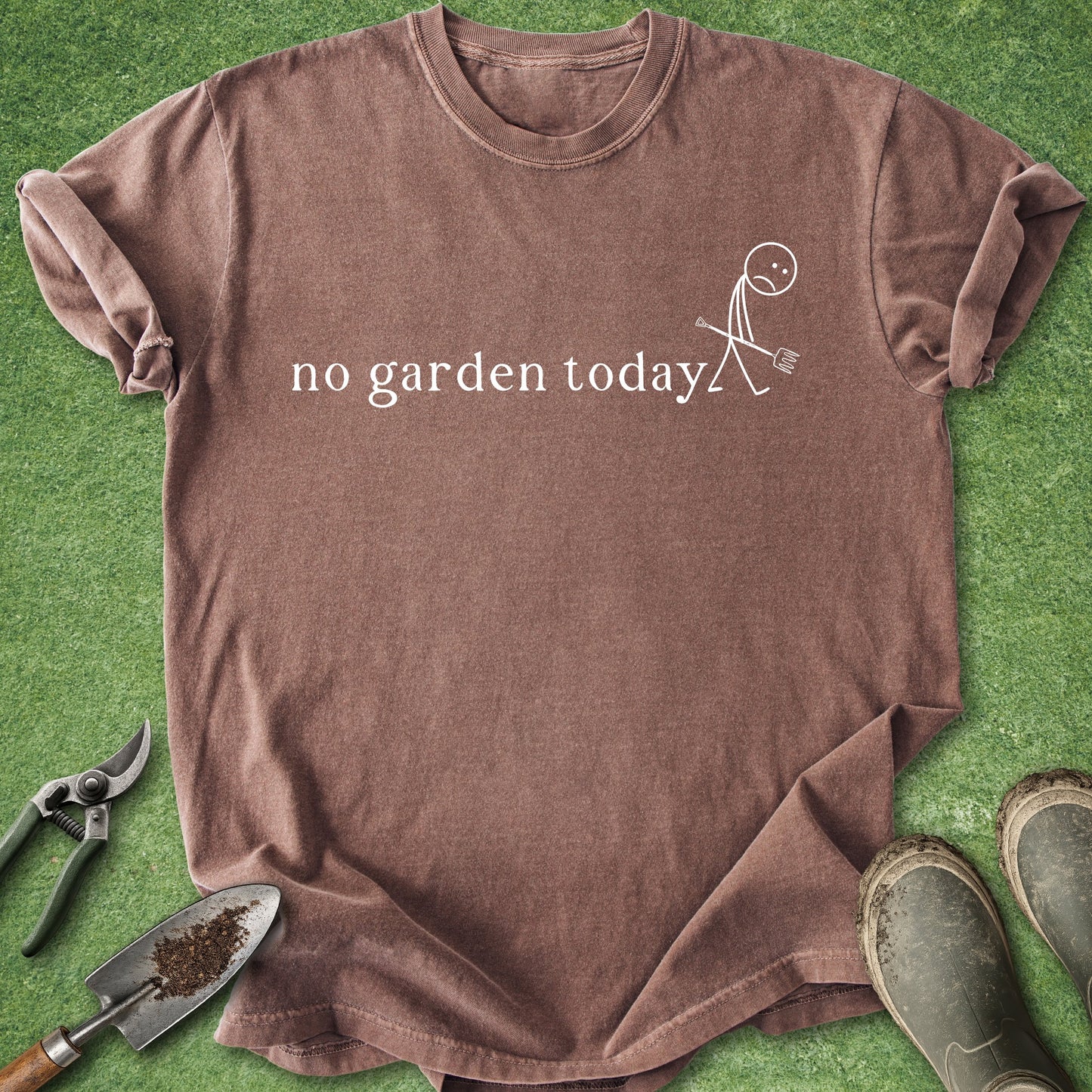 Brown t-shirt with 'no garden today' text on a grass background