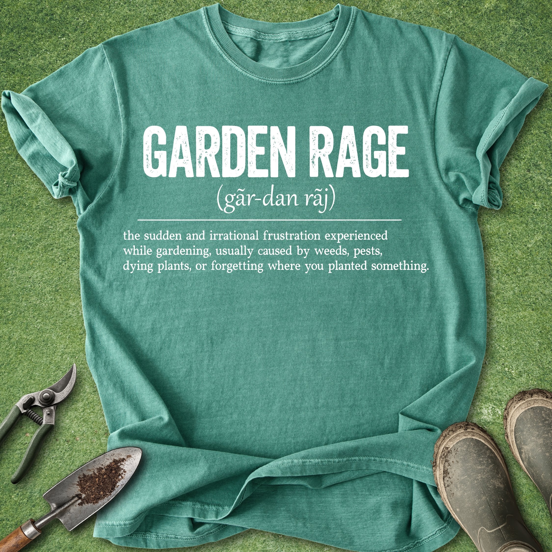 Green t-shirt with 'Garden Rage' text on a grass background