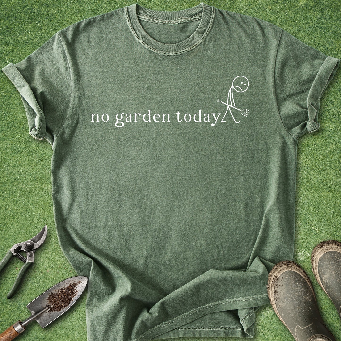 Green t-shirt with 'no garden today' text and graphic on a grass background