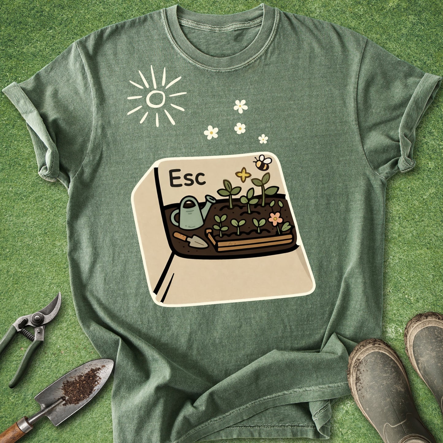 Green t-shirt with a gardening graphic and tools on a green background