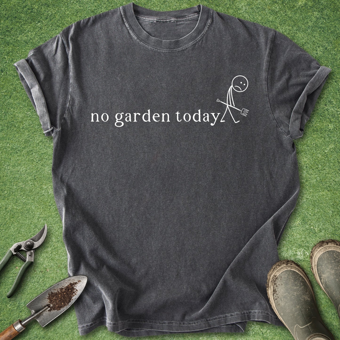 Black t-shirt with 'no garden today' text and stick figure on grass with gardening tools.