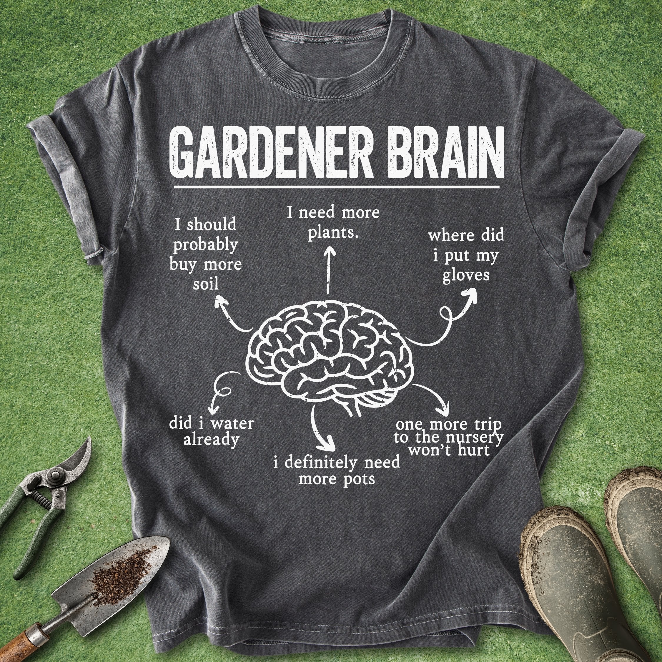 Gray t-shirt with 'Gardener Brain' graphic on a green background with gardening tools.