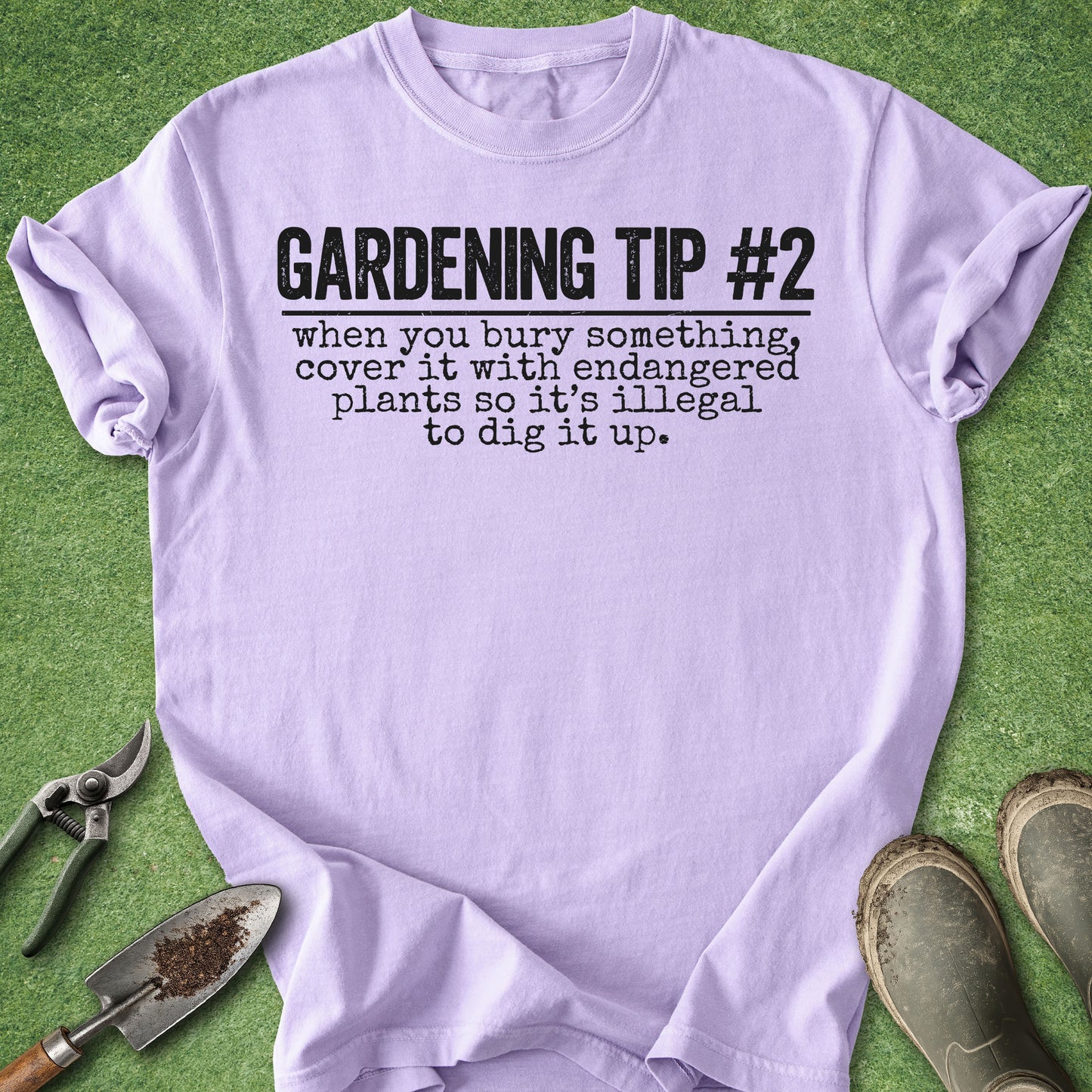 Orchid purple t-shirt featuring the funny text “Gardening Tip #2: When you bury something, cover it with endangered plants so it’s illegal to dig it up.”