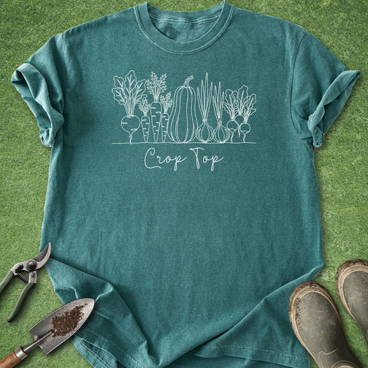 Funny gardening shirt featuring white line art vegetables including carrots, beets, onions, radishes, and squash with the phrase "Crop Top."