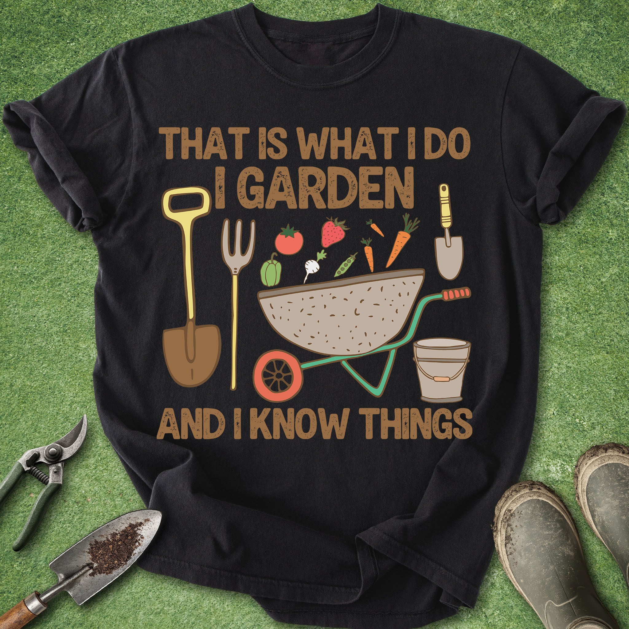 Black t-shirt with gardening graphic and text on a green background
