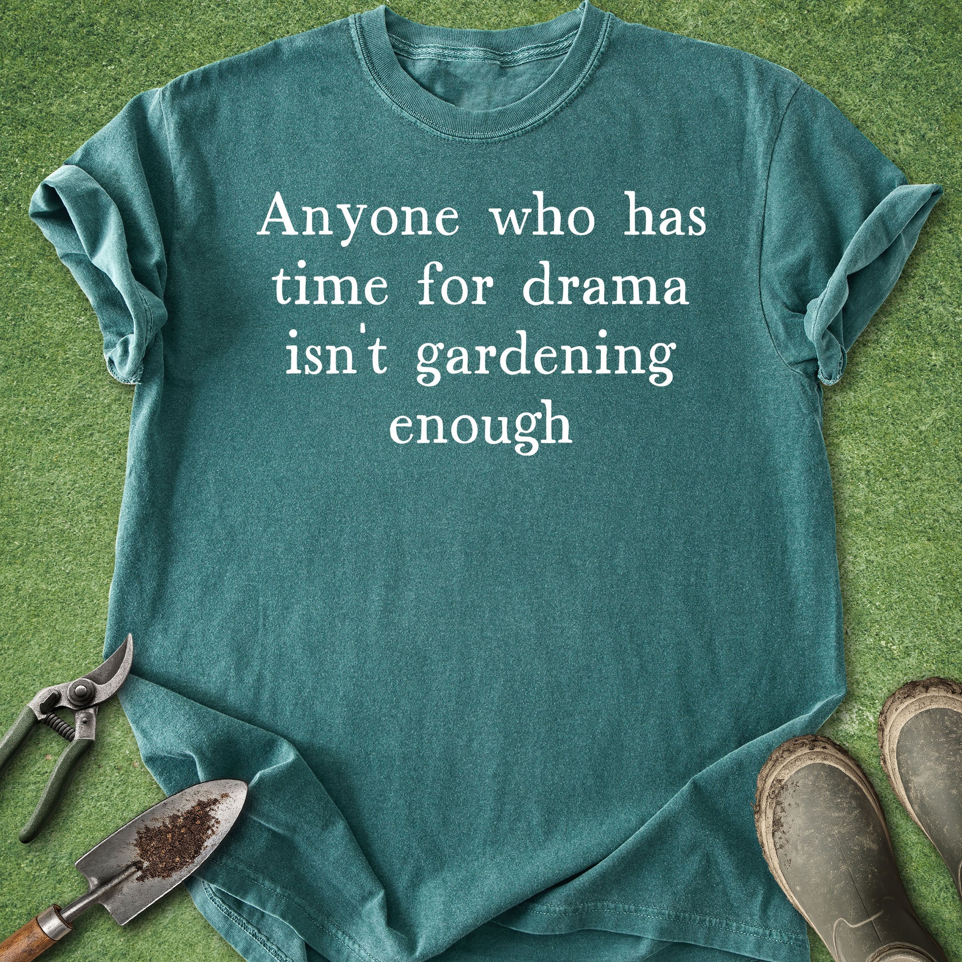 Funny gardening quote t-shirt reading “Anyone who has time for drama isn’t gardening enough” on blue spruce shirt
