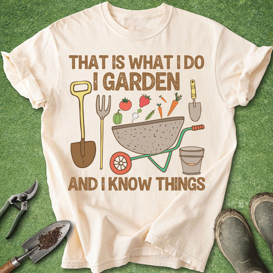 Beige t-shirt with gardening-themed design and tools on a green background