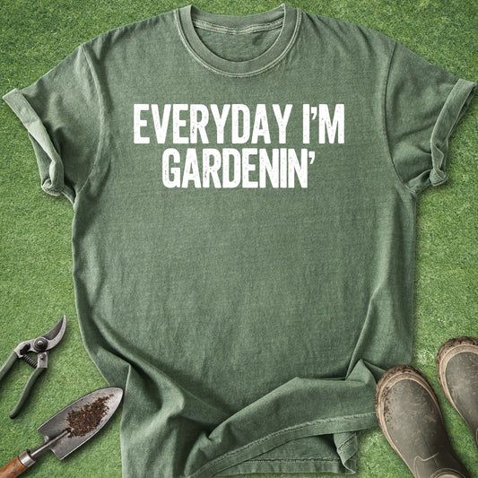 Comfort Colors moss t-shirt featuring the funny gardening quote "Everyday I'm Gardenin'" in distressed white vintage lettering.