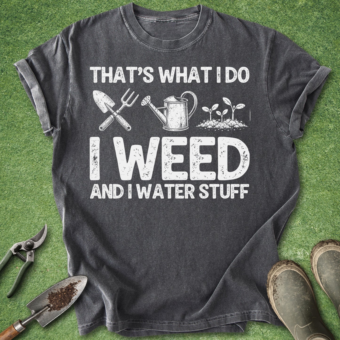 Pepper Comfort Colors t-shirt featuring the funny gardening quote "That's What I Do I Weed and I Water Stuff" with a trowel, hand fork, watering can, and seedling illustrations in a distressed vintage style.