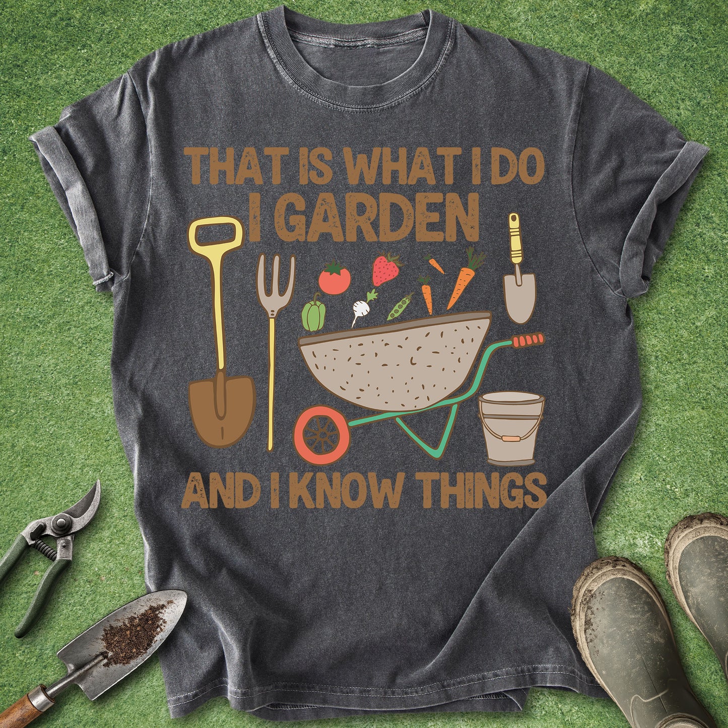 Gray t-shirt with gardening graphic and text on a green grass background