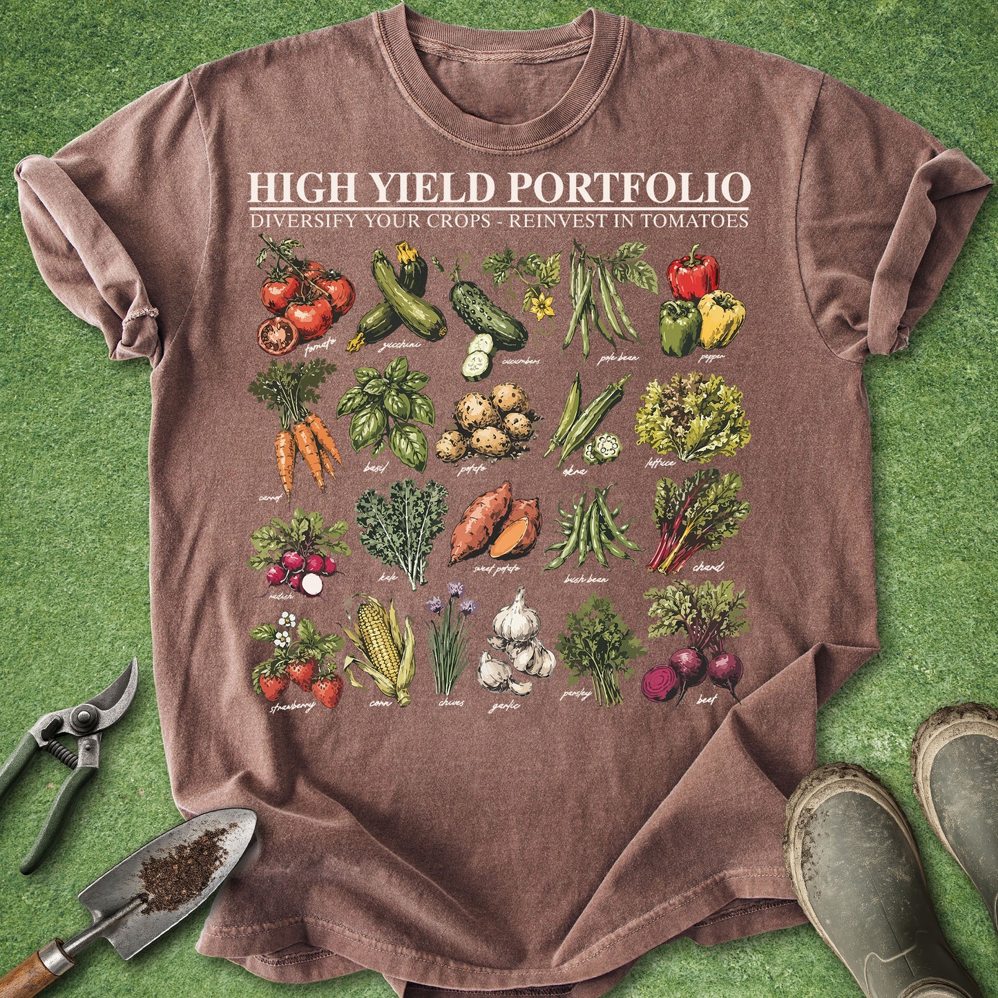 Brown t-shirt with vegetable illustrations and text on a green background