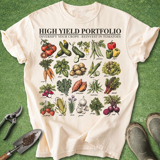 Beige t-shirt with vegetable illustrations and text on a green background