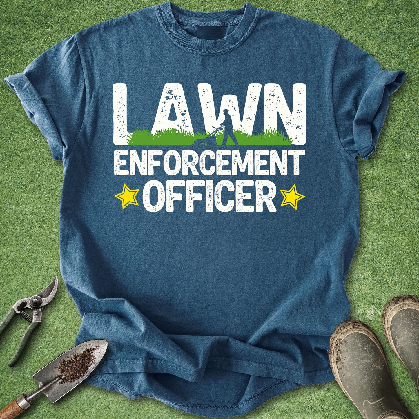 Blue t-shirt with 'Lawn Enforcement Officer' text on a grass background