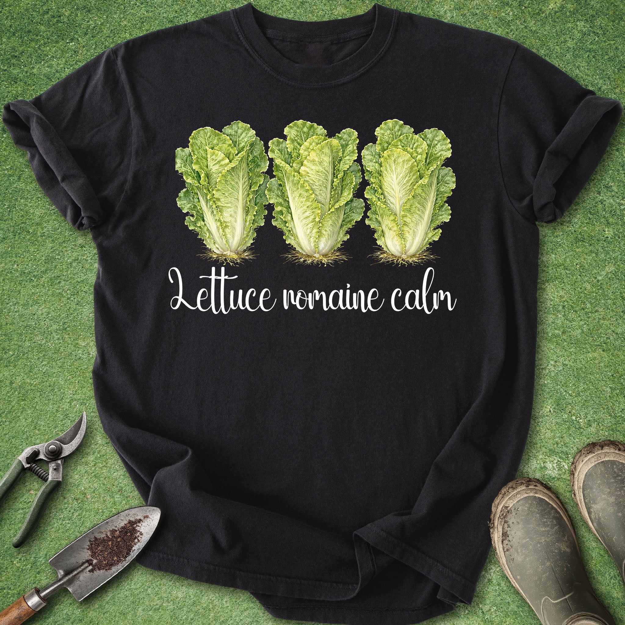 Black t-shirt with lettuce graphic and text on a green background