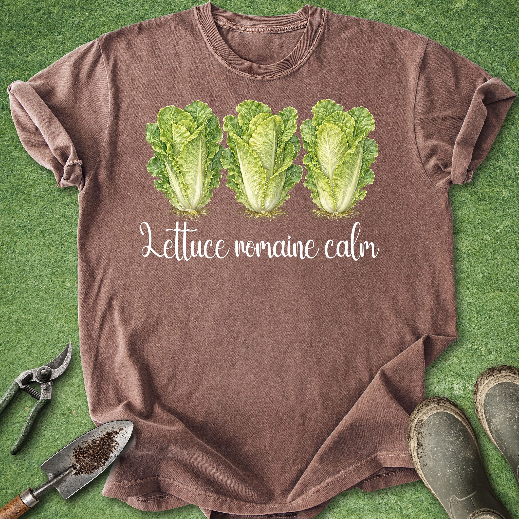 Brown t-shirt with lettuce graphic and text on a green background