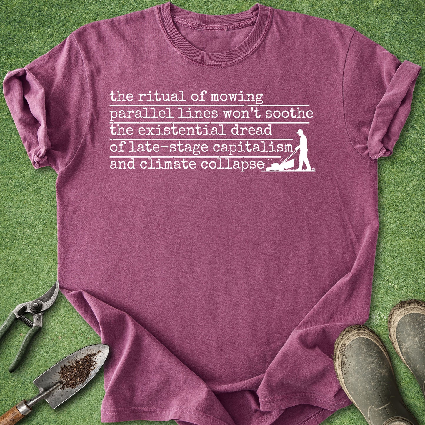 Funny existential lawn mowing t-shirt with sarcastic text and mower silhouette on pepper black shirt