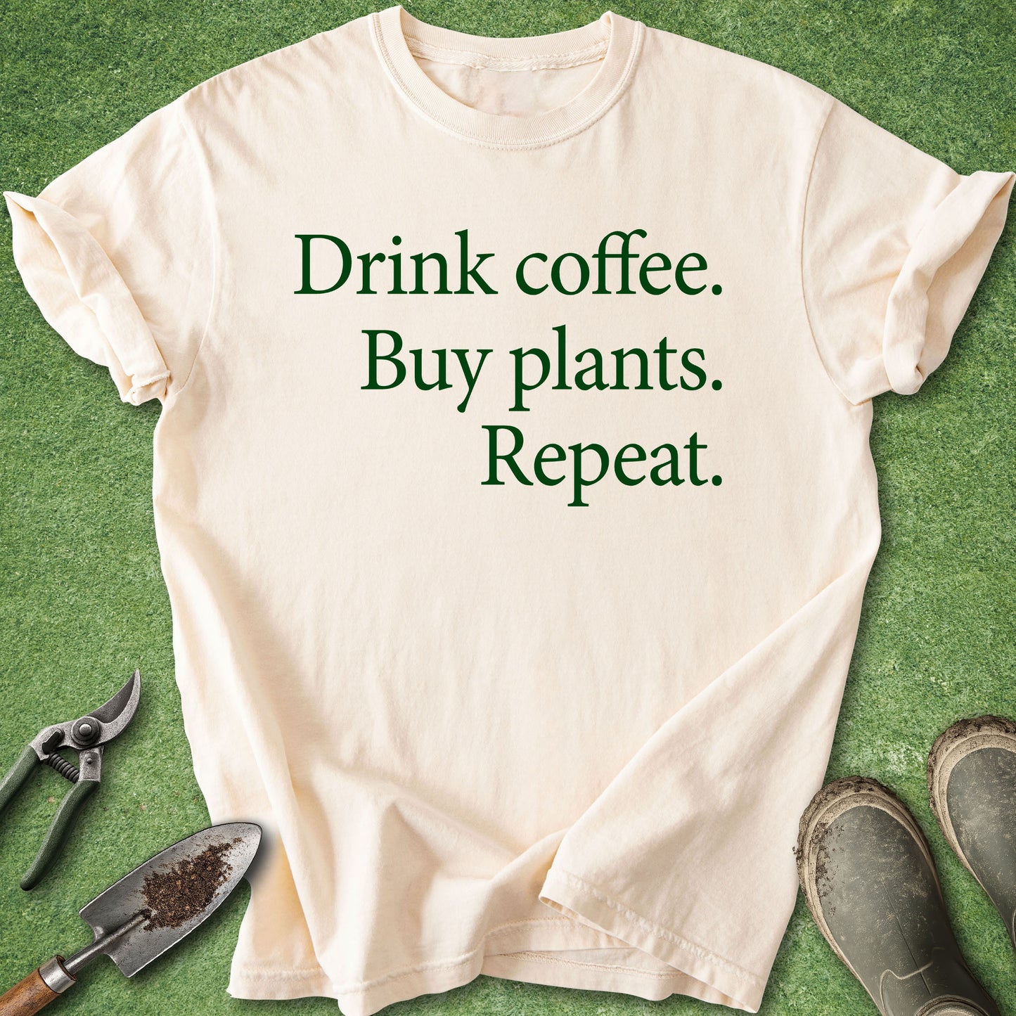 Minimalist green typography design reading "Drink Coffee. Buy Plants. Repeat." printed on a Comfort Colors 1717 plant lover and gardening t-shirt.