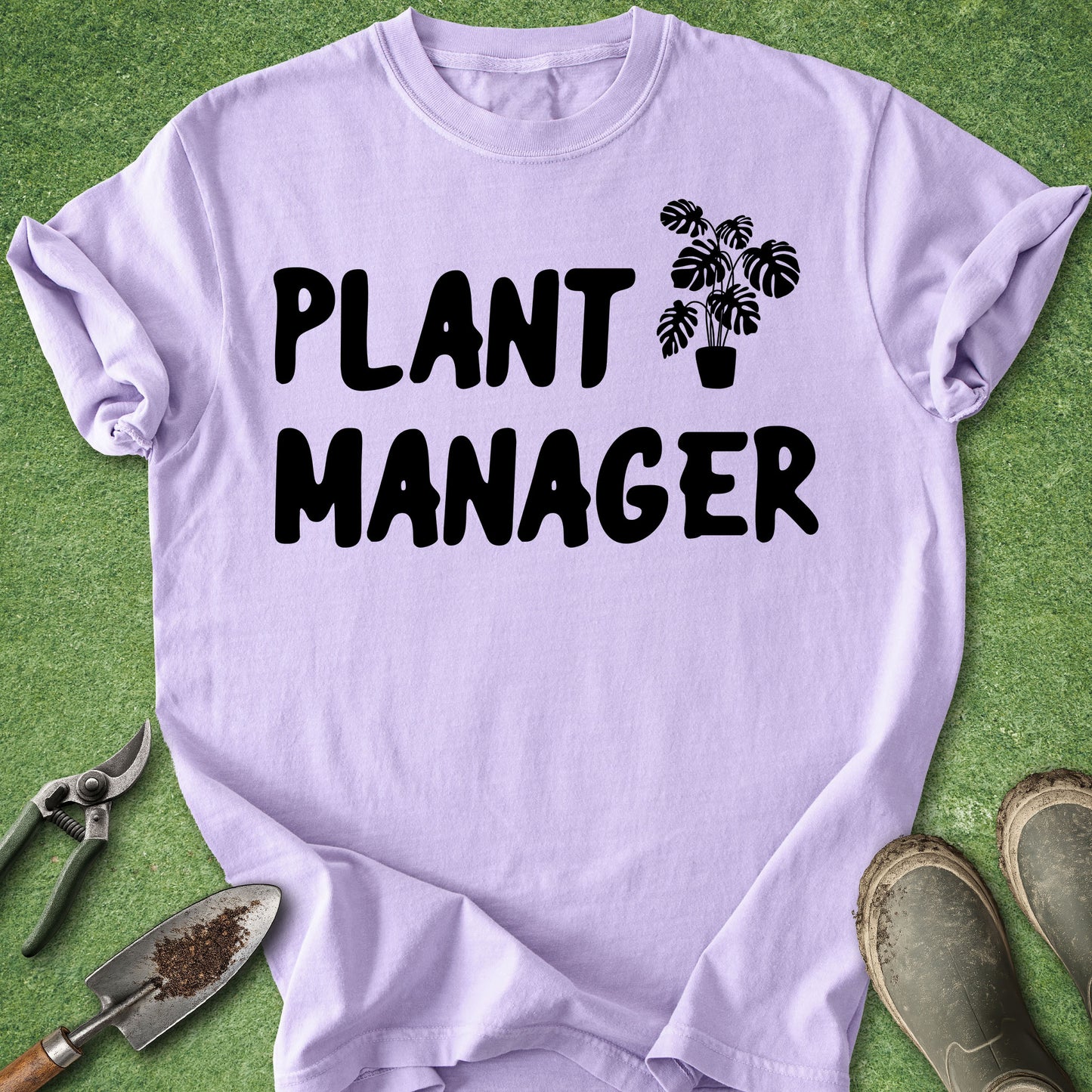 Light purple t-shirt with 'Plant Manager' text and plant icon on a green grass background