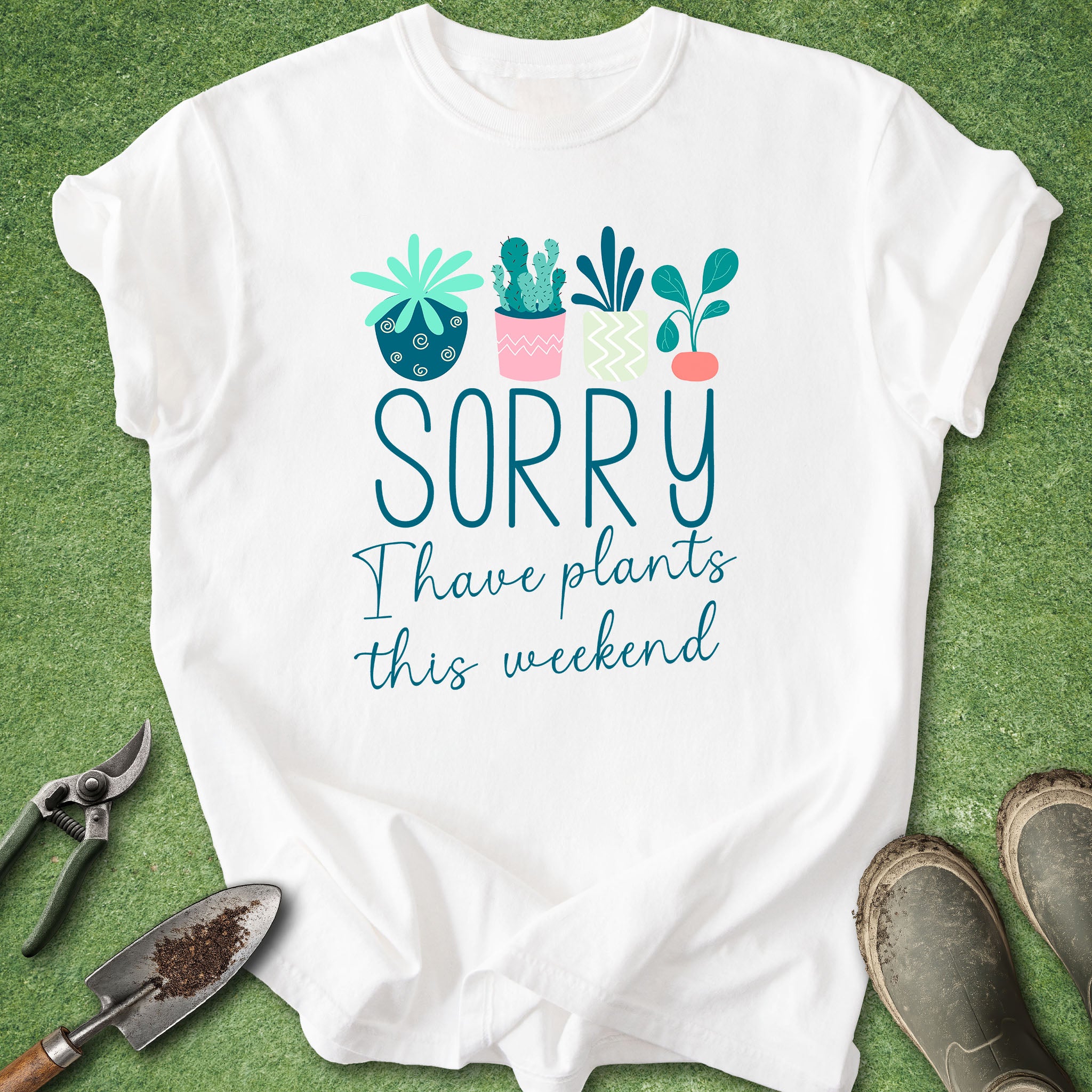 White t-shirt with plant-themed text on a green background