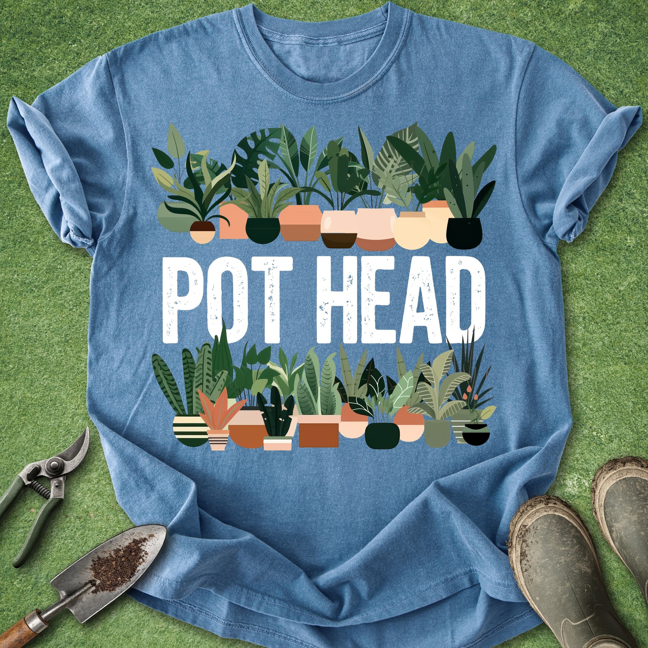 Blue t-shirt with 'POT HEAD' text and plant illustrations on a green background