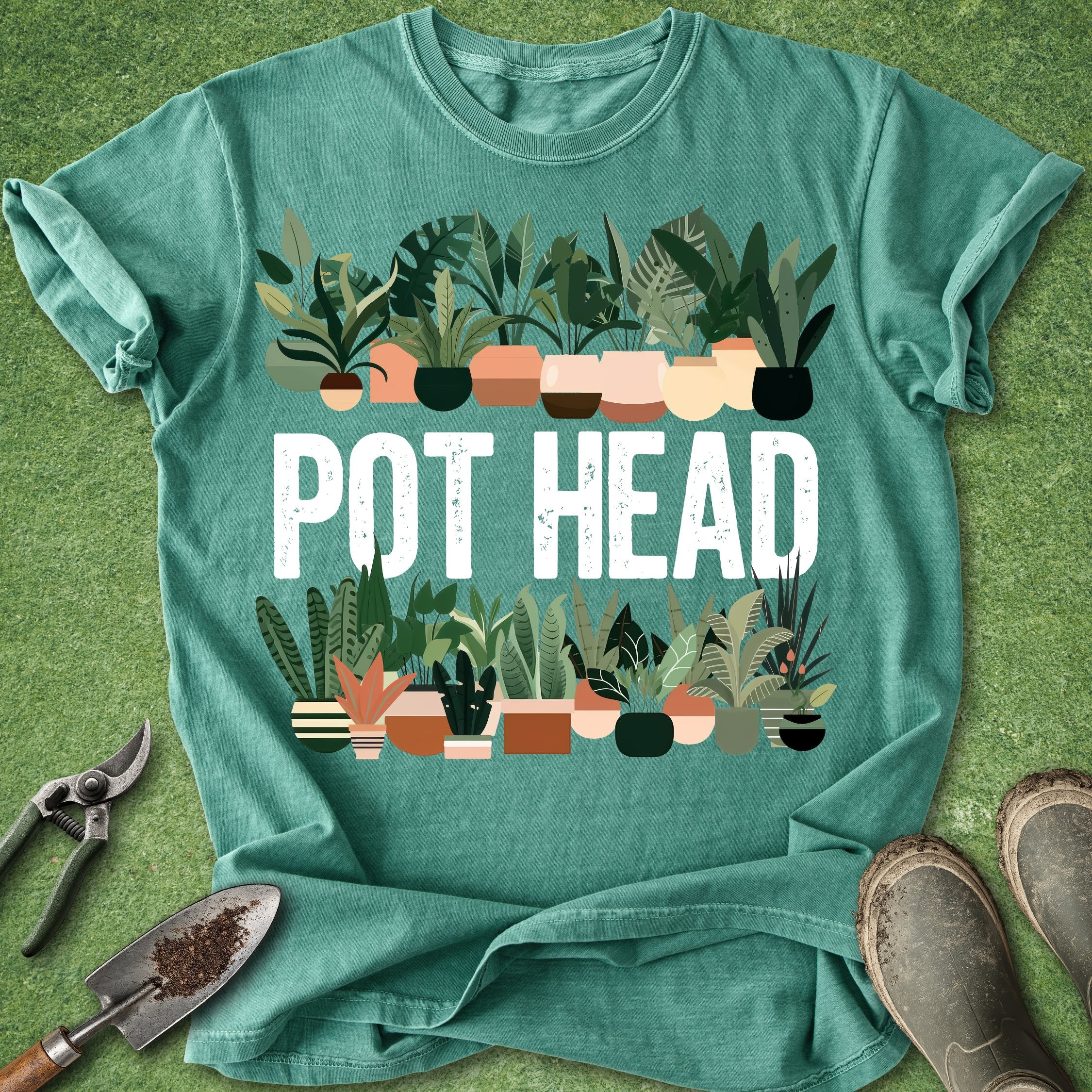 Teal t-shirt with 'POT HEAD' text and plant illustrations on a green background