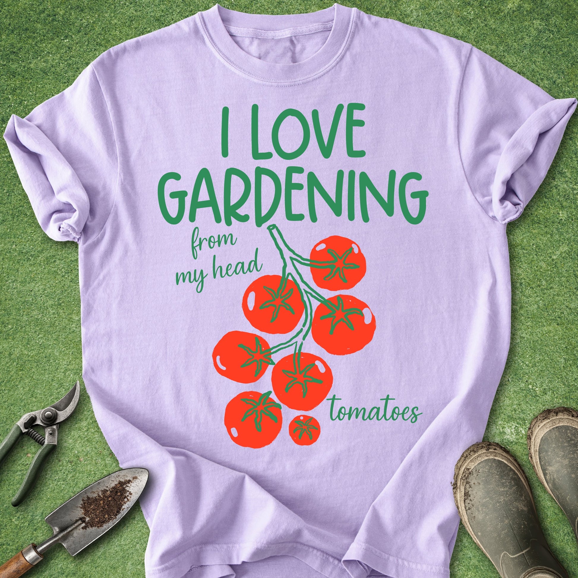 Light purple t-shirt with 'I love gardening from my head tomatoes' text and tomato graphics on a green background.