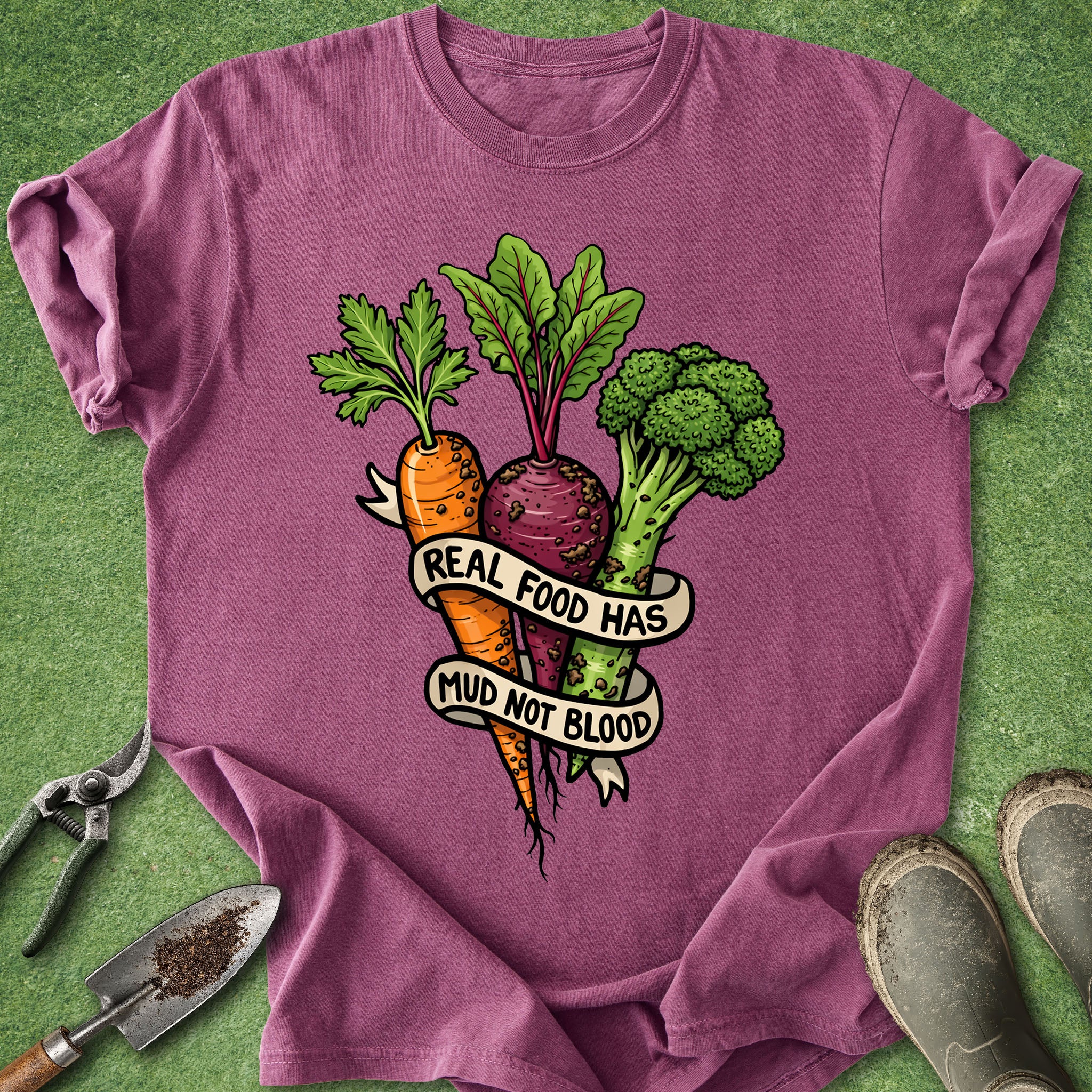 Purple t-shirt with vegetable graphic and text on a green background