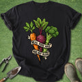 Black t-shirt with vegetable graphic and text on a green background