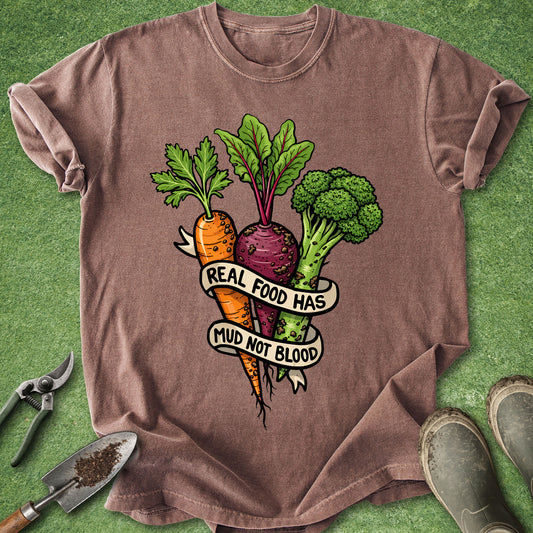 Brown t-shirt with vegetable graphic and text on a green background