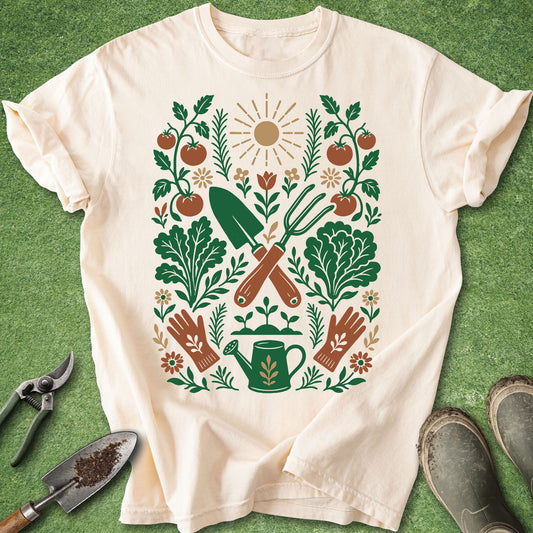 Botanical gardening design featuring tomatoes, leafy vegetables, flowers, a watering can, gardening gloves, a hand trowel, and a hand fork arranged in a vintage folk art style.