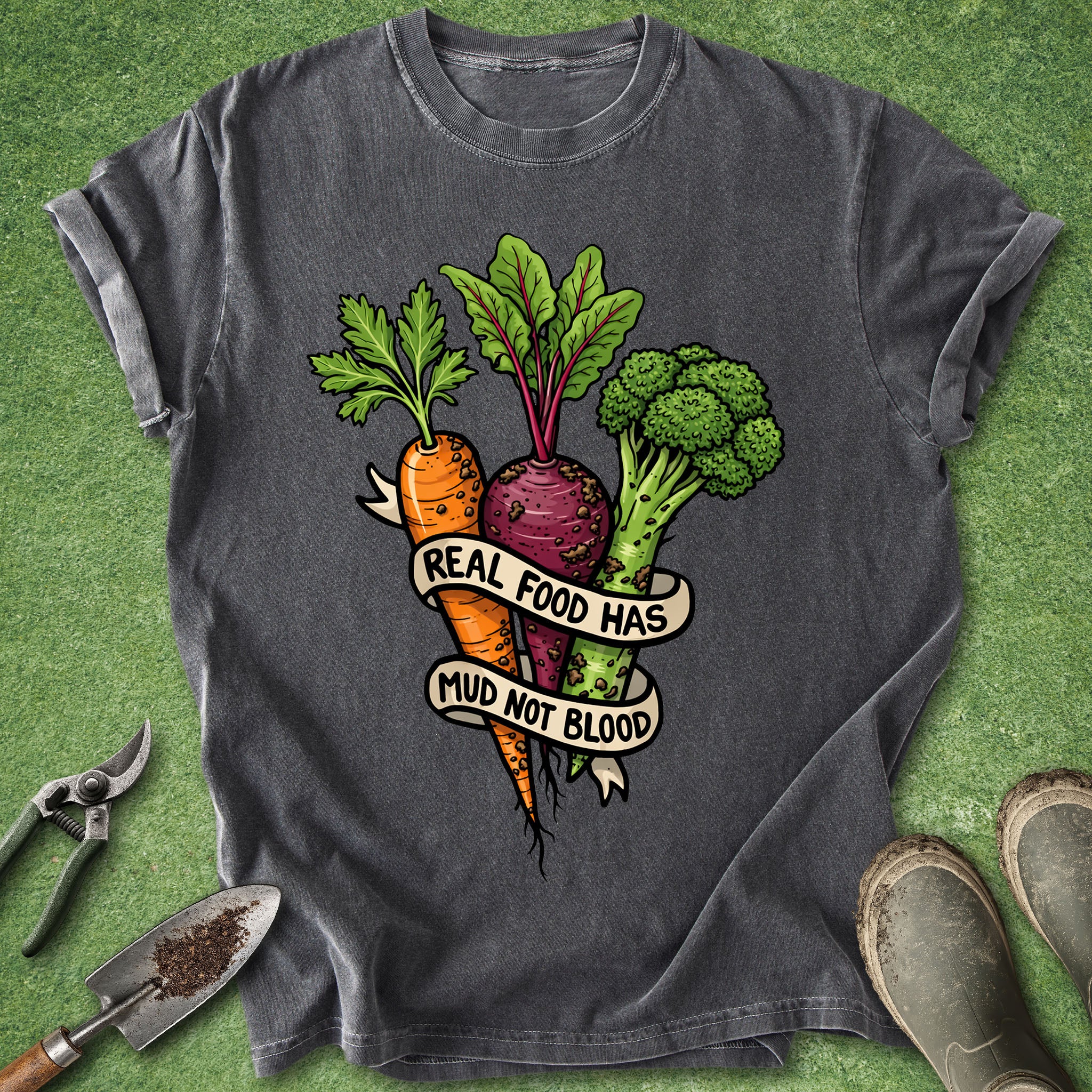Gray t-shirt with vegetable graphic and text on a green grass background